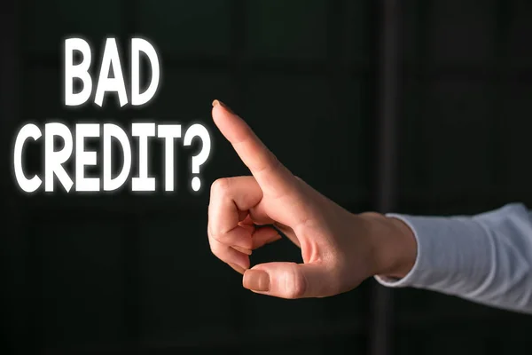 Writing note showing Bad Creditquestion. Business photo showcasing inabilityof a demonstrating to repay a debt on time and in full Finger pointing in the Dark with hand pointing in the copy space. — Stock Photo, Image