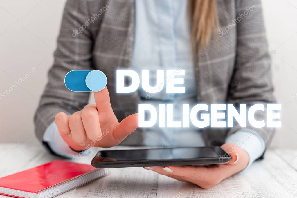 Conceptual hand writing showing Due Diligence. Business photo showcasing Comprehensive Appraisal Voluntary Investigation Audit Business concept with communication mobile phone.