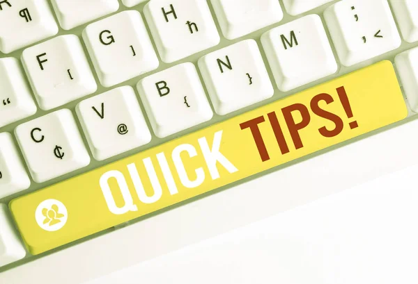 Word writing text Quick Tips. Business concept for small but particularly useful piece of practical advice White pc keyboard with empty note paper above white background key copy space.