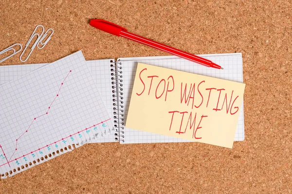 Word writing text Stop Wasting Time. Business concept for advising demonstrating or group start planning and use it Desk notebook paper office cardboard paperboard study supplies table chart. — Stock Photo, Image