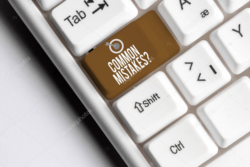 Text sign showing Common Mistakes Question. Conceptual photo repeat act or judgement misguided making something wrong White pc keyboard with empty note paper above white background key copy space.