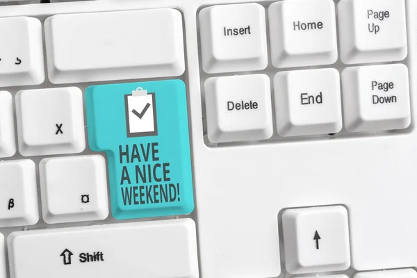 Handwriting text writing Have A Nice Weekend. Concept meaning wishing someone that something nice happen holiday White pc keyboard with empty note paper above white background key copy space. — Stock Photo, Image