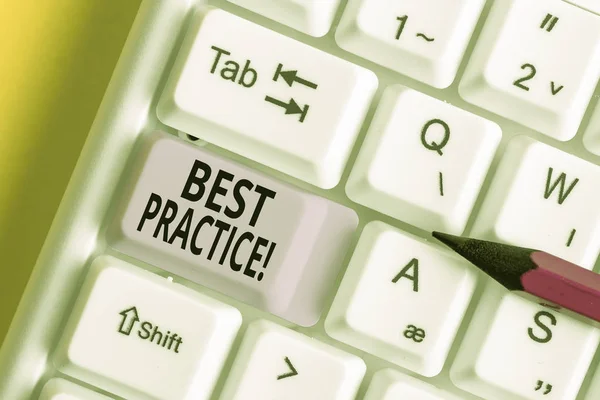 Conceptual hand writing showing Best Practice. Business photo text commercial procedures that are accepted prescribed being correct White pc keyboard with note paper above the white background. — Stock Photo, Image