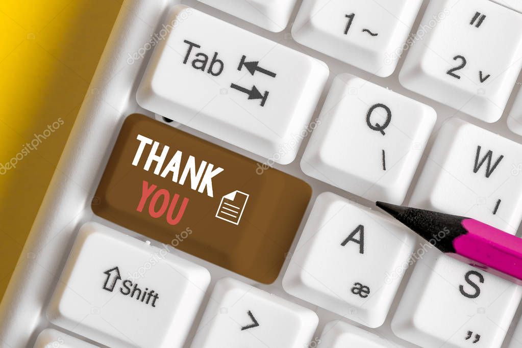Word writing text Thank You. Business concept for polite expression used when acknowledging gift service compliment White pc keyboard with empty note paper above white background key copy space.