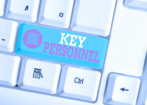 Writing note showing Key Personnel. Business photo showcasing Program Directors Principal Investigator Project Executives White pc keyboard with note paper above the white background.