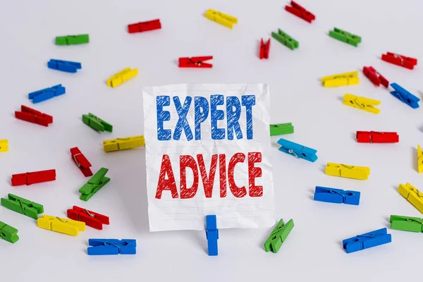 Text sign showing Expert Advice. Conceptual photo Sage Good Word Professional opinion Extensive skill Ace Colored clothespin papers empty reminder white floor background office. — Stock Photo, Image
