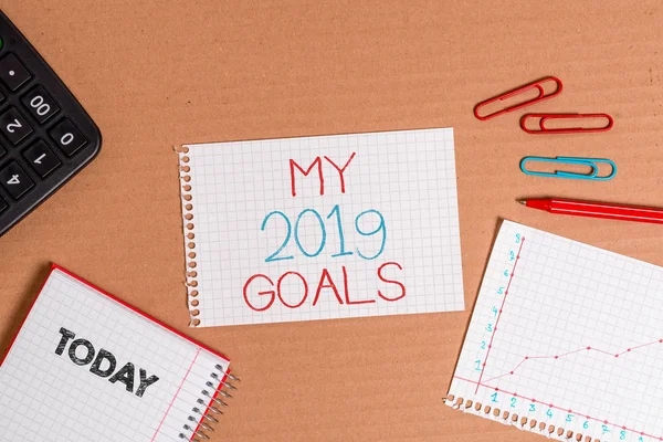 Writing note showing My 2019 Goals. Business photo showcasing setting up demonstratingal goals or plans for the current year Cardboard notebook office study supplies chart paper. — Stock Photo, Image