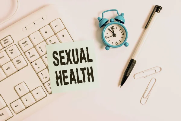 Conceptual hand writing showing Sexual Health. Business photo text positive and respectful approach to sexual relationships White pc keyboard with empty note paper above white background.