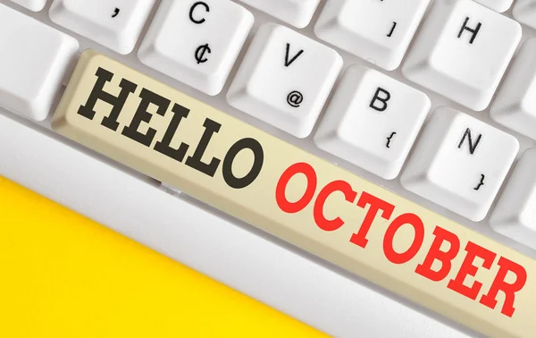 Signo de texto que muestra Hello October. Foto conceptual Último trimestre Décimo mes 30days Temporada Saludo Teclado de PC blanco con papel de nota vacío sobre el espacio de copia de la tecla de fondo blanco . — Foto de Stock