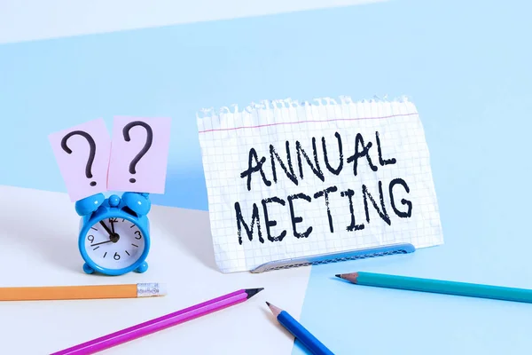 Handwriting text writing Annual Meeting. Concept meaning yearly meeting of the general membership of an organization.