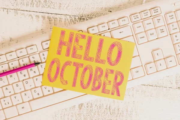 Signo de texto que muestra Hello October. Foto conceptual Último trimestre Décimo mes 30días Temporada Saludo Teclado blanco suministros de oficina en forma de rectángulo vacío papel recordatorio madera . —  Fotos de Stock