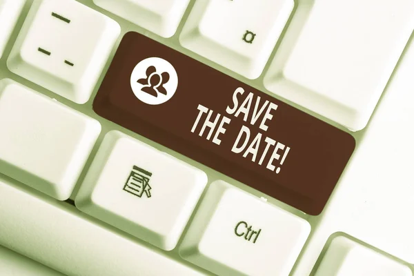 Word writing text Save The Date. Business concept for reserve the mentioned future wedding date on their calendar White pc keyboard with empty note paper above white background key copy space.
