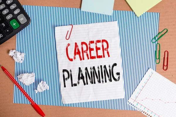 Text sign showing Career Planning. Conceptual photo Strategically plan your career goals and work success Striped paperboard notebook cardboard office study supplies chart paper.