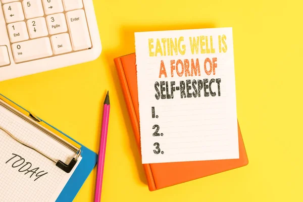 Writing note showing Eating Well Is A Form Of Self Respect. Business photo showcasing a quote of promoting healthy lifestyle Pile of empty papers with copy space on the table.