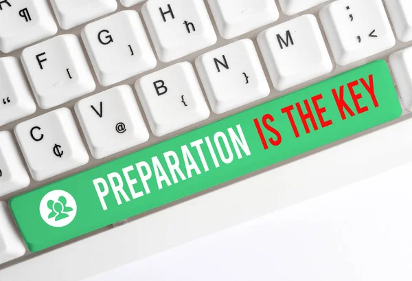 Writing note showing Preparation Is The Key. Business photo showcasing it reduces errors and shortens the activities White pc keyboard with note paper above the white background.