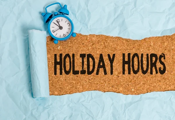 Handwriting text writing Holiday Hours. Concept meaning employee receives twice their normal pay for all hours. — Stock Photo, Image