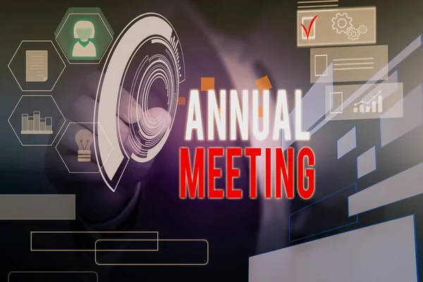 Word writing text Annual Meeting. Business concept for yearly meeting of the general membership of an organization Male human wear formal work suit presenting presentation using smart device.