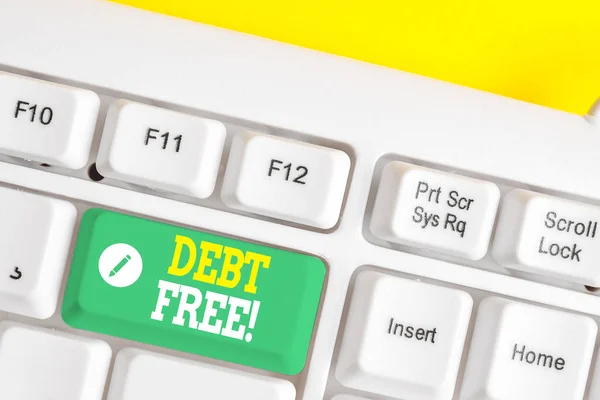 Segno di testo che mostra Debt Free. La foto concettuale non possiede denaro o cose a qualsiasi individuo o azienda Tastiera bianca per pc con carta a note vuote sopra lo spazio di copia del tasto di sfondo bianco . — Foto Stock