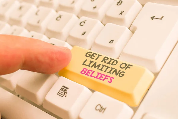 Writing note showing Get Rid Of Limiting Beliefs. Business photo showcasing remove negative beliefs and think positively White pc keyboard with note paper above the white background.