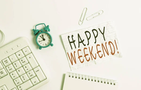 Writing note showing Happy Weekend. Business photo showcasing something nice has happened or they feel satisfied with life Blank paper with copy space on the table with clock and pc keyboard.