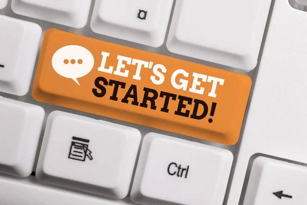 Text sign showing Let S Get Started. Conceptual photo encouraging someone to begin doing something White pc keyboard with empty note paper above white background key copy space. — Stock Photo, Image