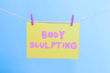 Vücut Heykel gösteren kavramsal el yazısı. Vücut s artan İş fotoğraf metin etkinliği görünür kas tonusu Clothespin dikdörtgen şeklinde kağıt hatırlatma beyaz ahşap masa.