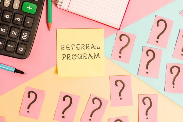 Conceptual hand writing showing Referral Program. Business photo text employees are rewarded for introducing suitable recruits Mathematics stuff and writing equipment on pastel background. — Stock Photo, Image