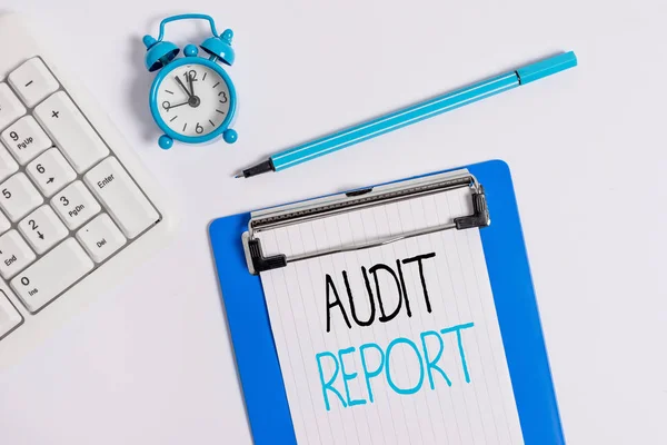 Conceptual hand writing showing Audit Report. Business photo showcasing An appraisal of complete financial status of a business Assets Flat lay above table with clock pc keyboard and note paper. — Stock Photo, Image