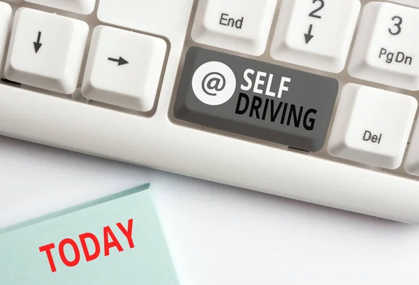 Word writing text Self Driving. Business concept for Autonomous vehicle Ability to navigate without huanalysis input White pc keyboard with empty note paper above white background key copy space. — Stock Photo, Image