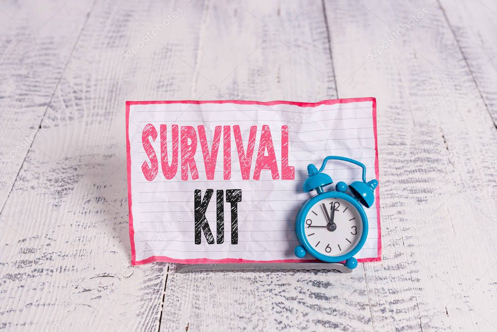 Text sign showing Survival Kit. Conceptual photo Emergency Equipment Collection of items to help someone.