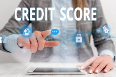Writing note showing Credit Score. Business photo showcasing Represent the creditworthiness of an individual Lenders rating Female human wear formal work suit presenting smart device.