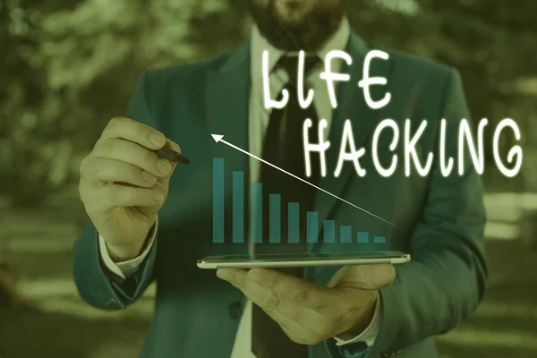 Word writing text Life Hacking. Business concept for Simple and clever techniques in accomplishing task easily Male human wear formal work suit presenting presentation using smart device.