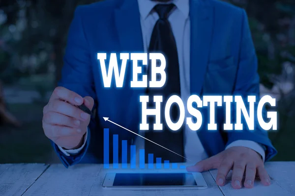 Handwriting text writing Web Hosting. Concept meaning The activity of providing storage space and access for websites Male human wear formal work suit presenting presentation using smart device.