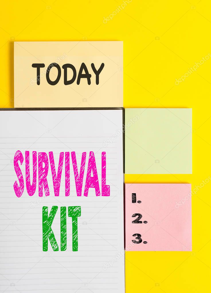 Word writing text Survival Kit. Business concept for Emergency Equipment Collection of items to help someone Colored empty papers with copy space on the yellow background table.
