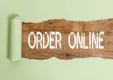 Sipariş Çevrimiçi'ni gösteren metin işareti. Kavramsal fotoğraf Internet üzerinden satıcılardan mal ve hizmet satın alma.