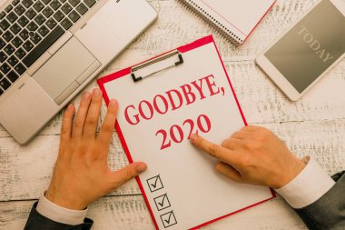 El yazısı metin Goodbye 2020. Kavramı yeni yıl eve Milestone Geçen Ay Kutlama Geçiş anlamı.