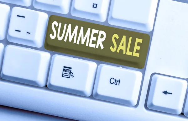 Conceptual hand writing showing Summer Sale. Business photo text Annual discount events that takes place during summer season White pc keyboard with note paper above the white background. — Stock Photo, Image