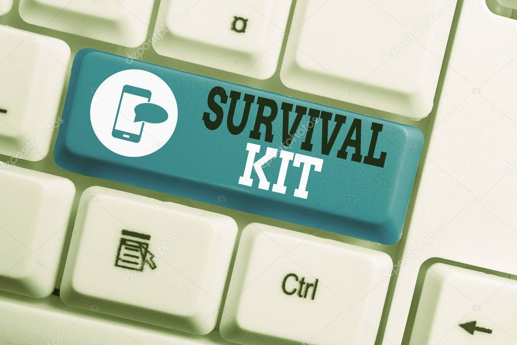Conceptual hand writing showing Survival Kit. Business photo text Emergency Equipment Collection of items to help someone Keyboard with note paper on white background key copy space.