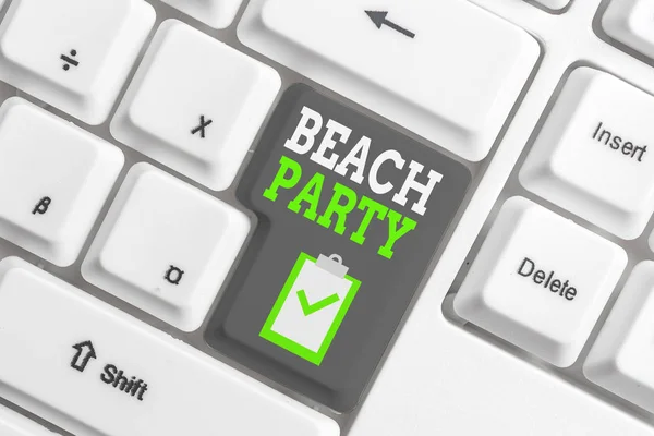 Handwriting text writing Beach Party. Concept meaning small or big festival held on sea shores usually wearing bikini White pc keyboard with empty note paper above white background key copy space. — Stock Photo, Image