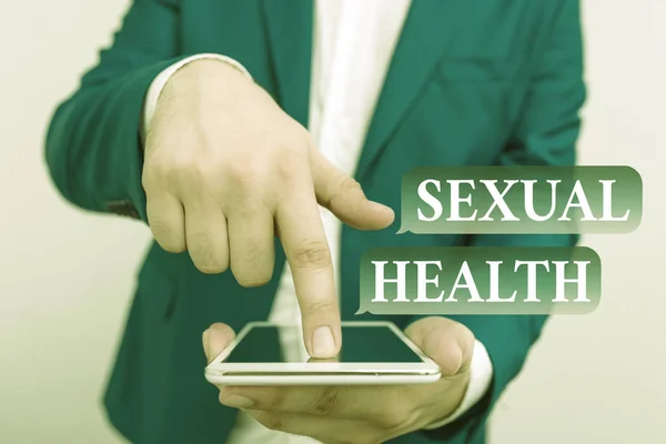Szöveges jel mutatja szexuális egészség. Fogalmi fotó egészségesebb test kielégítő szexuális élet pozitív kapcsolatok üzletember a kék lakosztály lap tetejére mutatva ujjal. — Stock Fotó