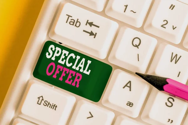 Writing note showing Special Offer. Business photo showcasing Discounted price Markdown Promotional Items Crazy Sale White pc keyboard with note paper above the white background.