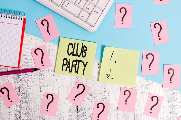 Conceptual hand writing showing Club Party. Business photo text social gathering in a place that is informal and can have drinks Writing tools and scribbled paper on top of the wooden table. — Stock Photo, Image