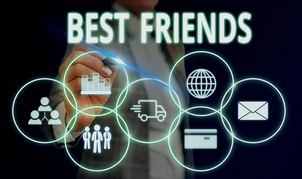 Handwriting text Best Friends. Concept meaning A demonstrating you value above other demonstratings Forever buddies Woman wear formal work suit presenting presentation using smart device. — Stock Photo, Image