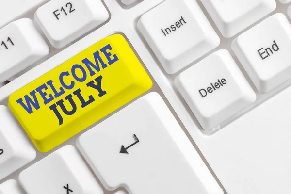 Handwriting text Welcome July. Concept meaning Calendar Seventh Month 31days Third Quarter New Season White pc keyboard with empty note paper above white background key copy space. — Stock Photo, Image