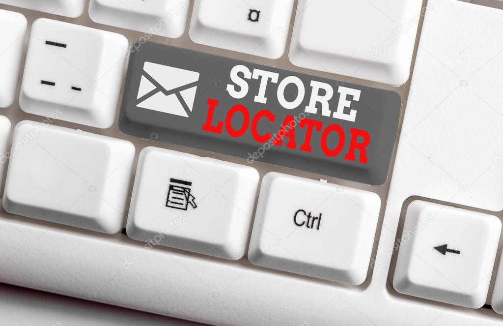 Conceptual hand writing showing Store Locator. Business photo showcasing to know the address contact number and operating hours White pc keyboard with note paper above the white background.