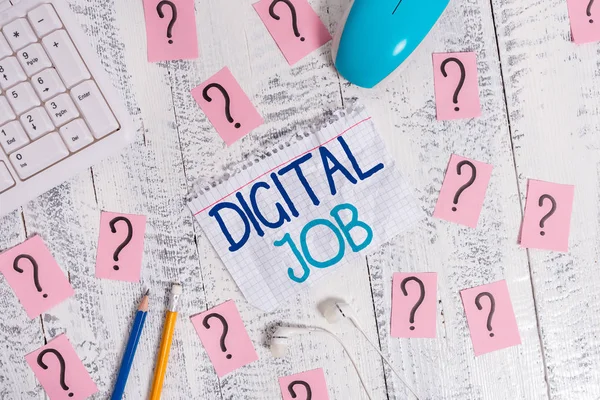 Writing note showing Digital Job. Business photo showcasing get paid task done through internet and demonstratingal computer Writing tools and scribbled paper on top of the wooden table.