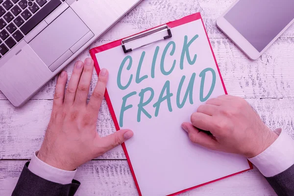 Conceptual hand writing showing Click Fraud. Business photo text practice of repeatedly clicking on advertisement hosted website.