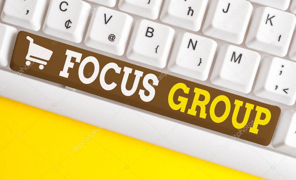 Word writing text Focus Group. Business concept for showing assembled to participate in discussion about something White pc keyboard with empty note paper above white background key copy space.