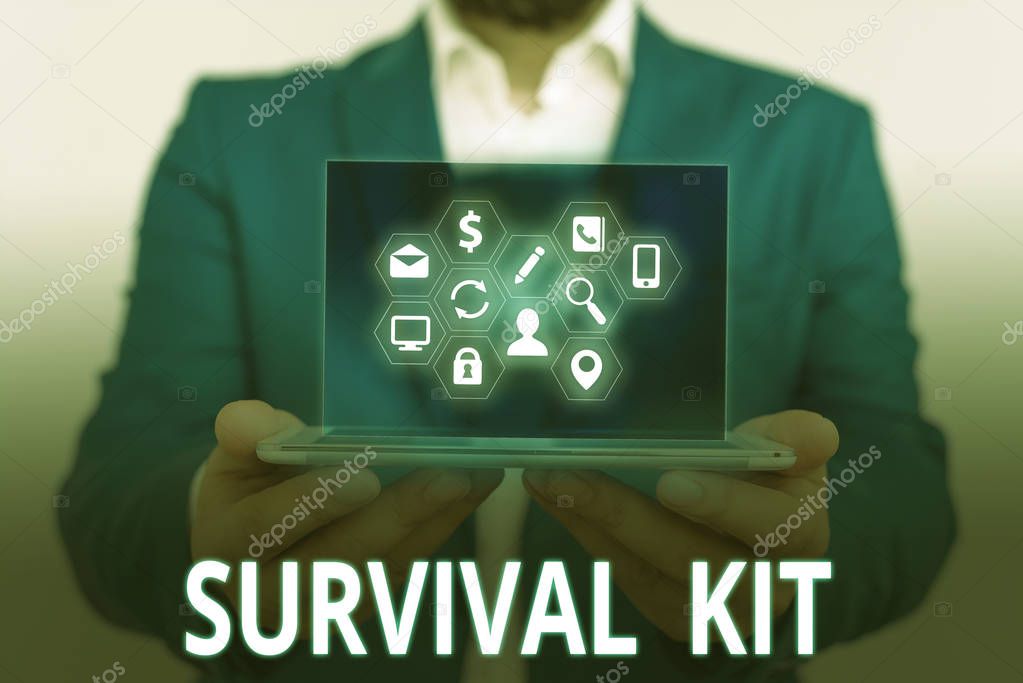 Conceptual hand writing showing Survival Kit. Business photo text Emergency Equipment Collection of items to help someone.