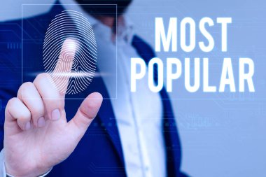 En Popüler gösteren not yazma. İş fotoğraf vitrin ilerki Beğendi Bir toplumda gösteren çoğunluğu tarafından Zevk Erkek sunum akıllı cihaz sunan resmi iş elbisesi giymek.